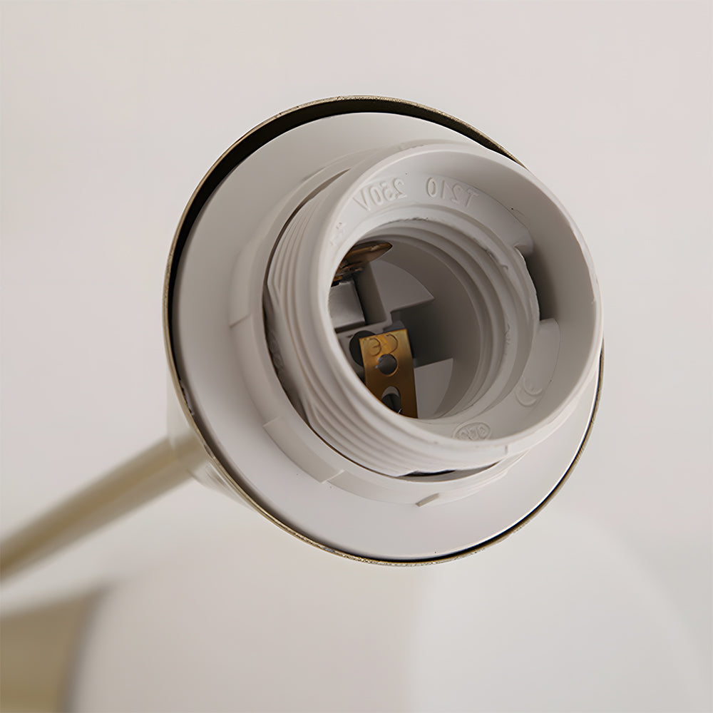 Close-up of a white light socket on a white background