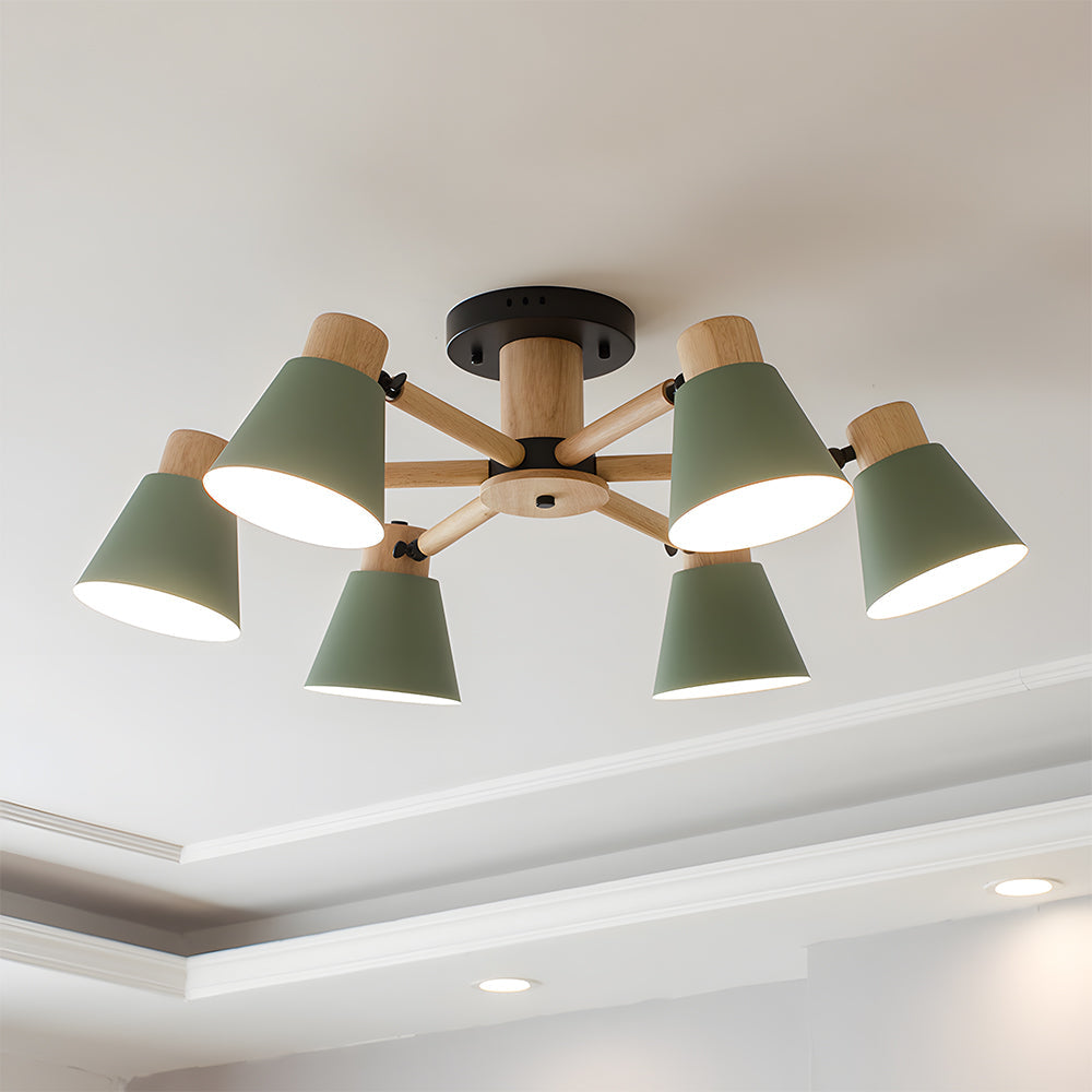Modern ceiling light fixture with green lampshades and wooden accents on a white ceiling.