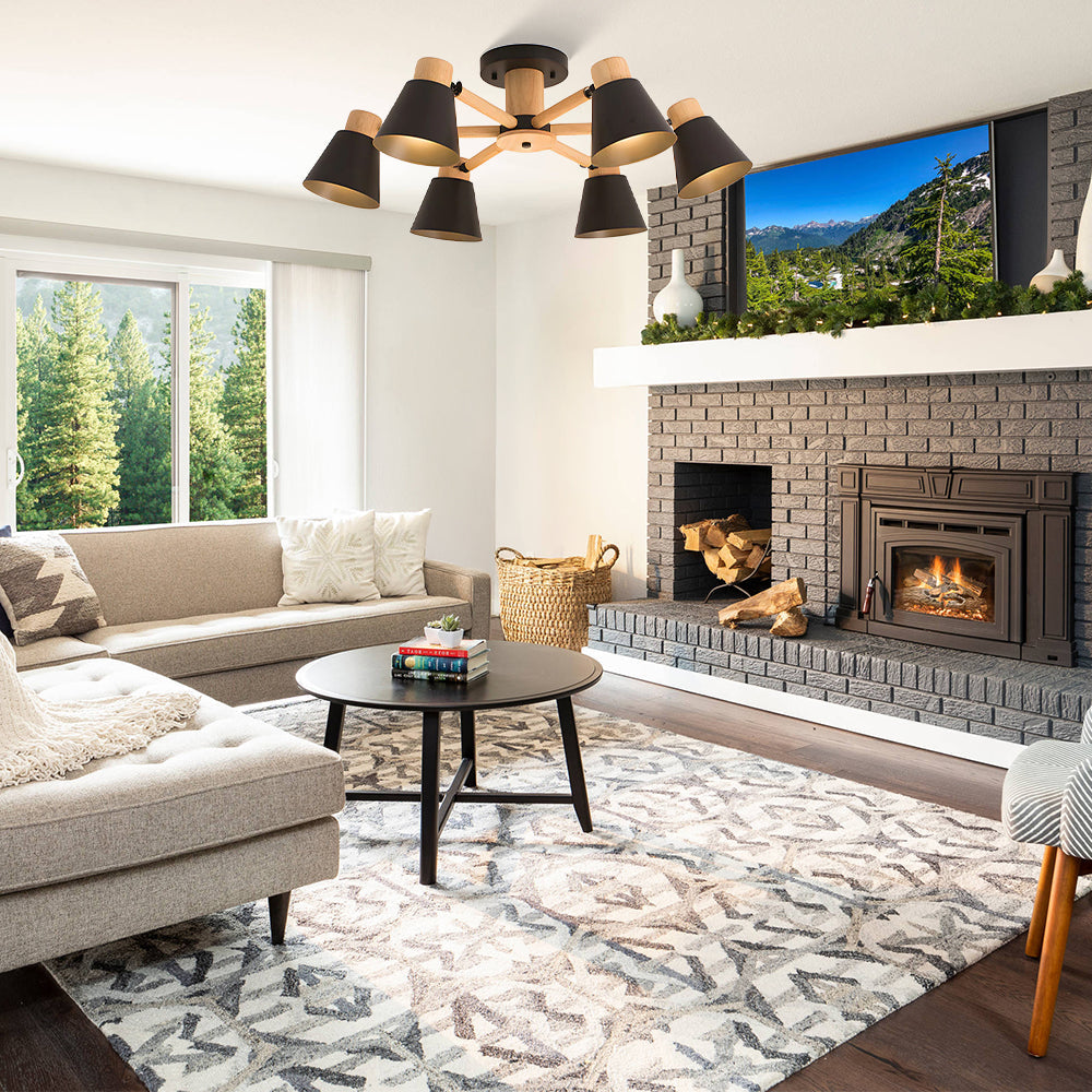 Modern living room with fireplace, TV, and furniture