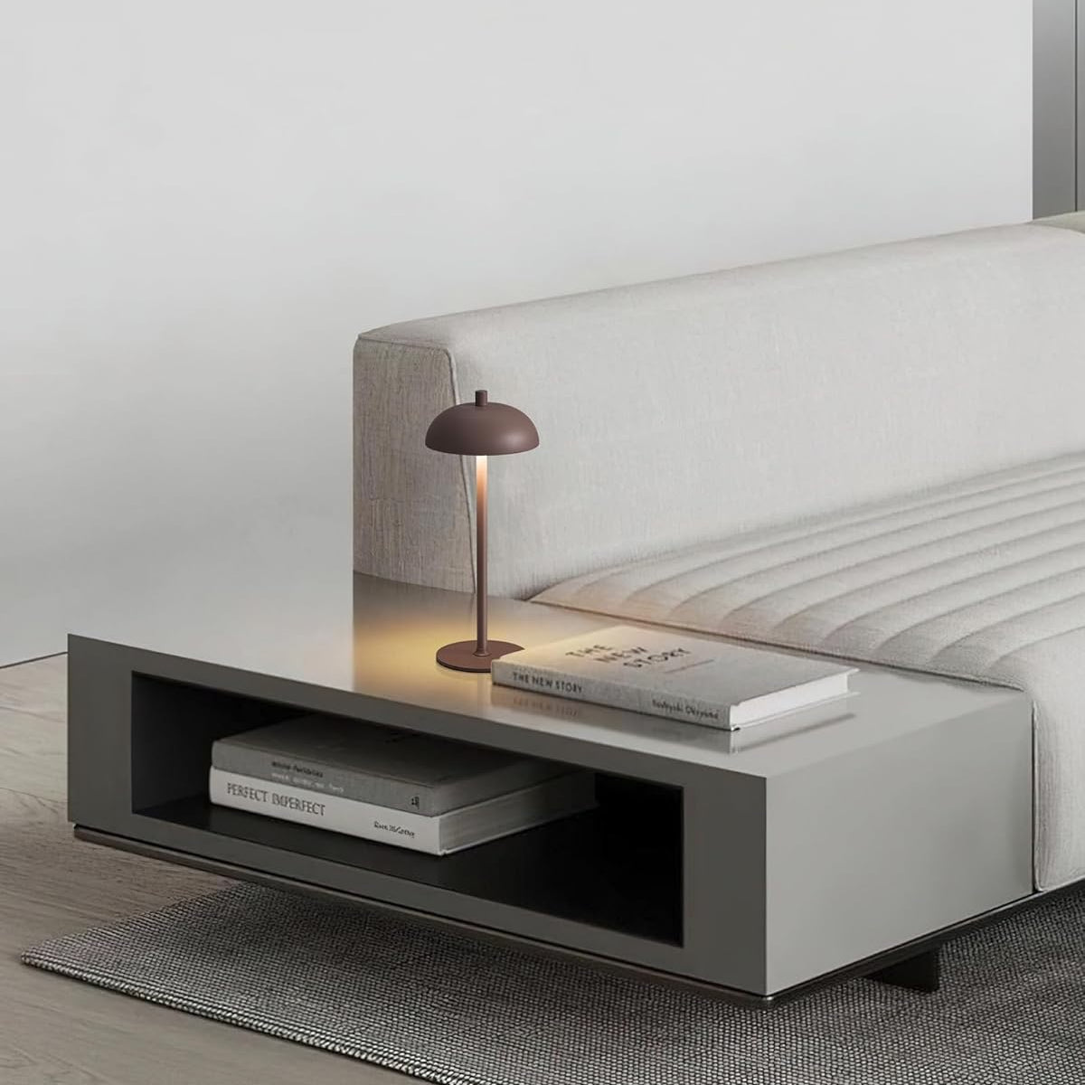 Modern bedroom setup with a bed, nightstand, and lamp.