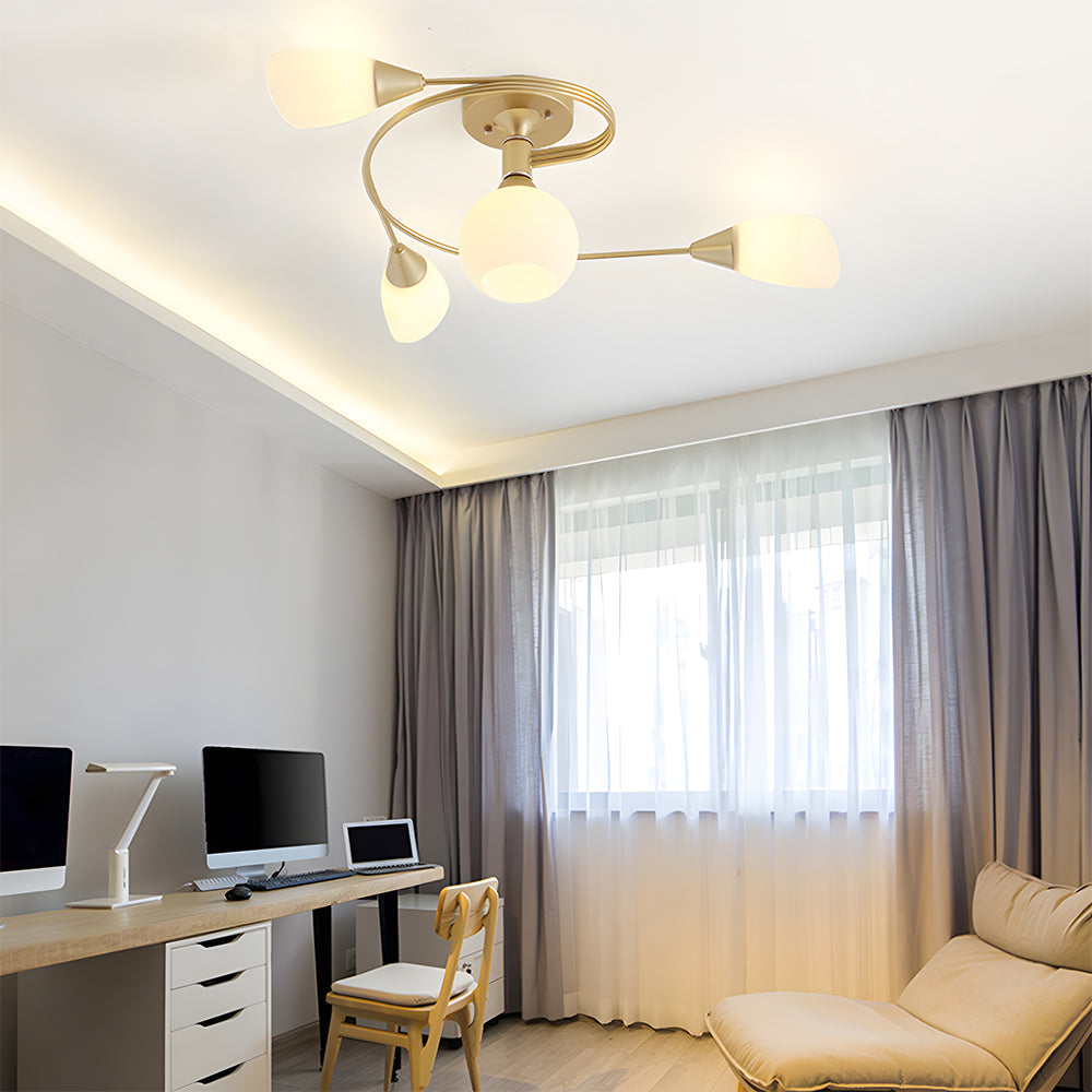 Modern home office with a ceiling light fixture, desk, and computer setup.