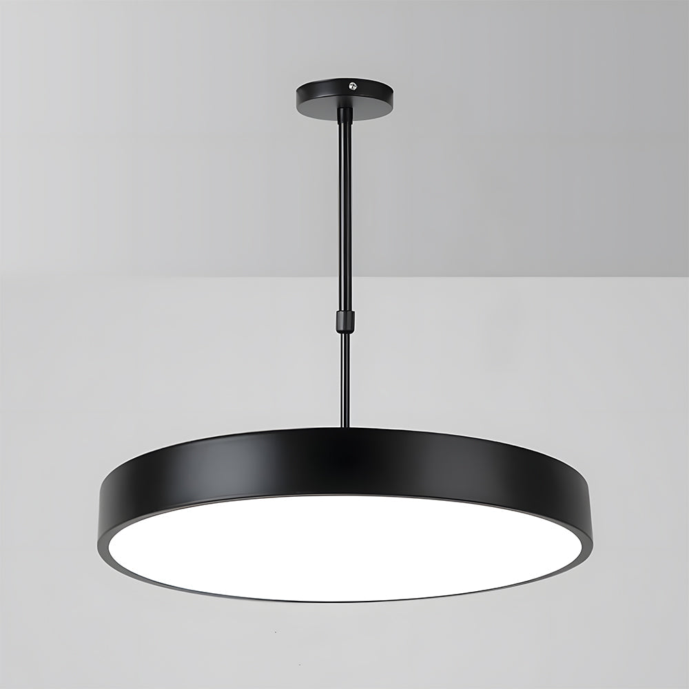 Black pendant light fixture on a gray background
