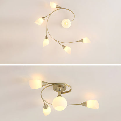 Modern ceiling light fixture with gold finish and white glass shades on a plain background.