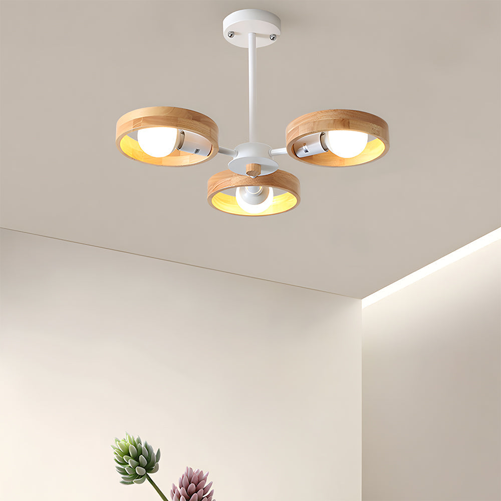 Modern ceiling light fixture with wooden accents on a neutral background