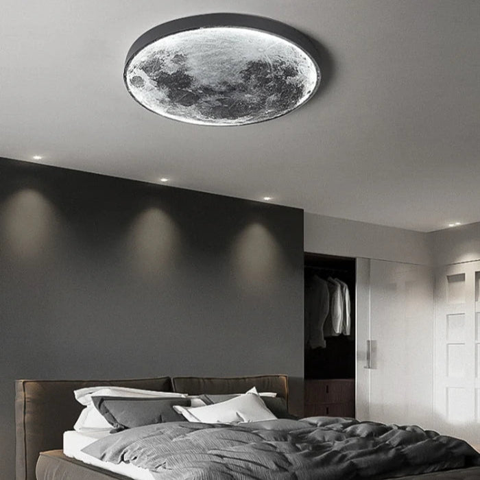 Modern bedroom with a moon-shaped ceiling light fixture.