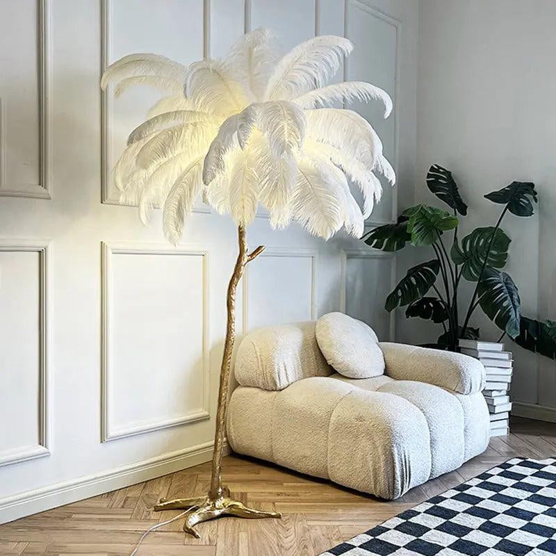 Feathered floor lamp in a modern living room with a white armchair and decorative plants.