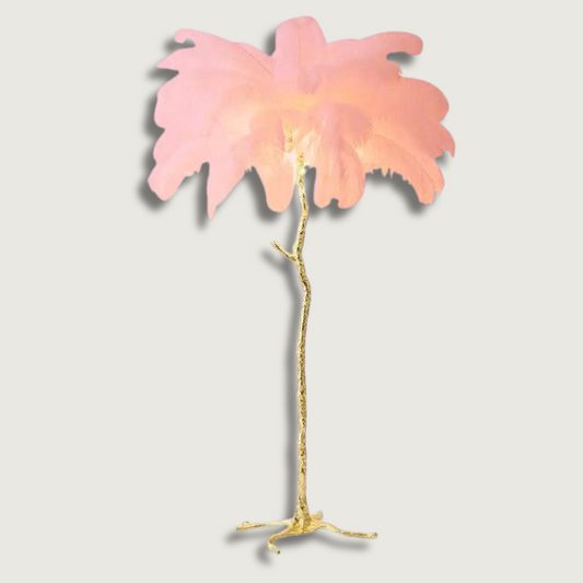 Decorative palm tree floor lamp with pink leaves on a light gray background